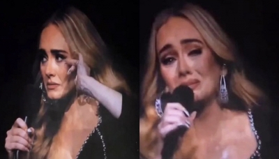 Adele tears up seeing man holding pic of his late wife at her concert