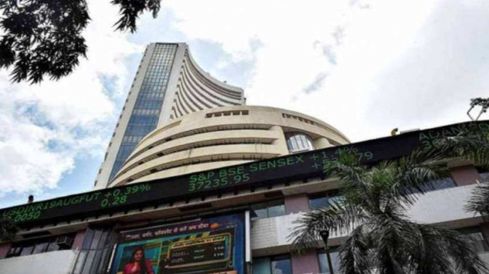Sensex, Nifty pare early gains to settle lower