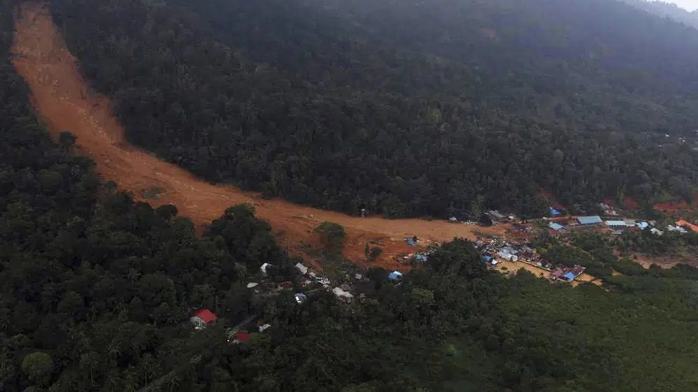 Indonesia landslide deaths climb to 21; dozens still missing Indonesia landslide deaths climb to 21; dozens still missing