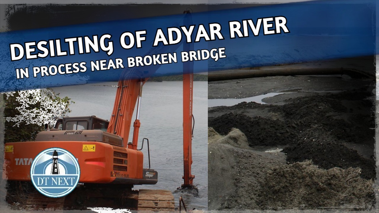 Desilting of the Adyar river in process near broken bridge Desilting of the Adyar river in process near broken bridge