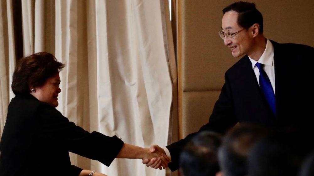 Philippines, China say to address maritime issues peacefully