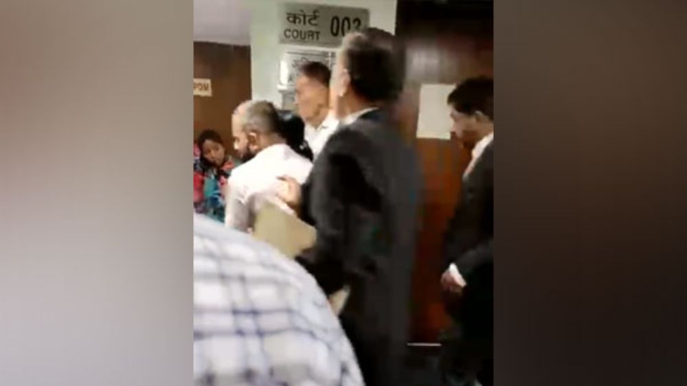 Woman shot at in Delhi court, rushed to hospital Woman shot at in Delhi court, rushed to hospital