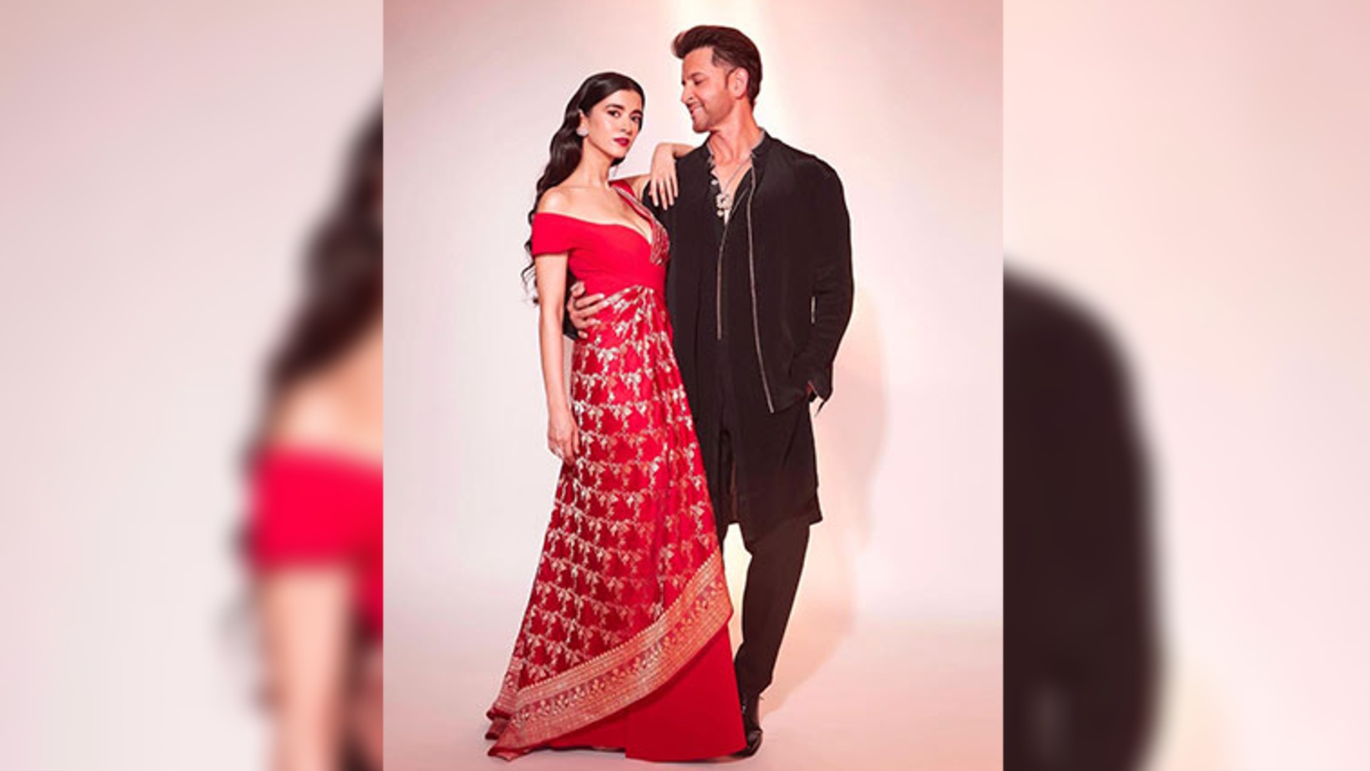 Hrithik Roshan shares pictures with lady in red, Sussanne reacts