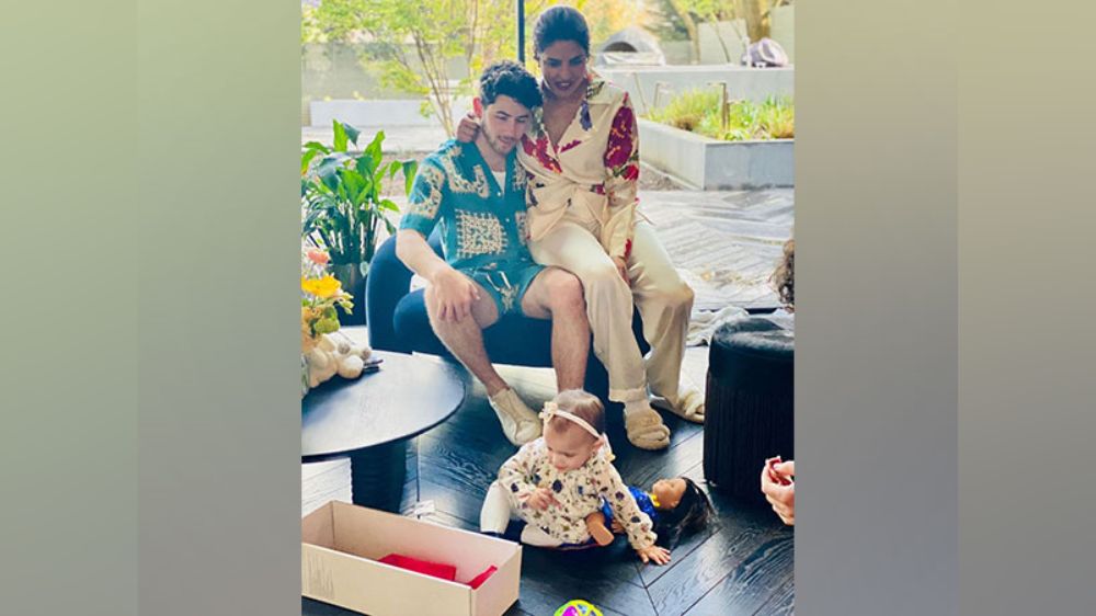 Priyanka, Nick watch Malti play in pic from Easter celebration