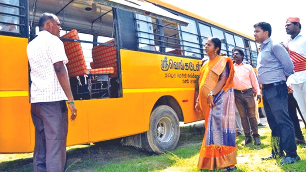 Collectors inspect school buses, interact with crew