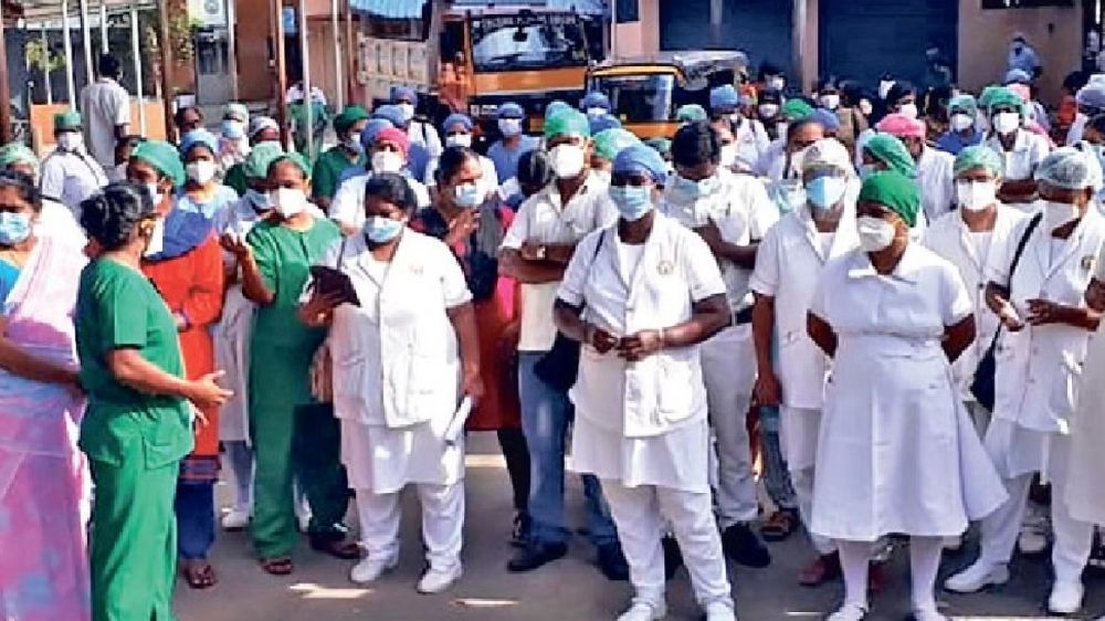Give us permanent jobs, unpaid wages: Nurses Give us permanent jobs, unpaid wages: Nurses