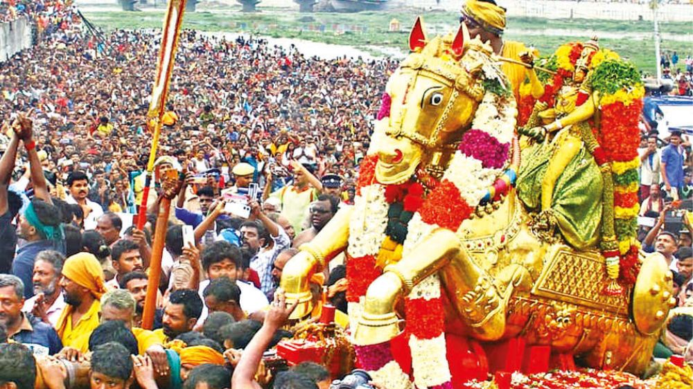 Govinda chants rent the air as Lord enters the Vaigai Govinda chants rent the air as Lord enters the Vaigai