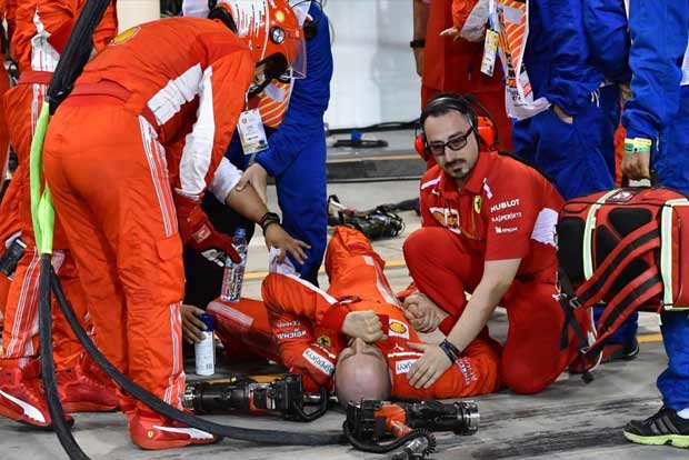 Motor racing: Injured Ferrari mechanic recovering after surgery