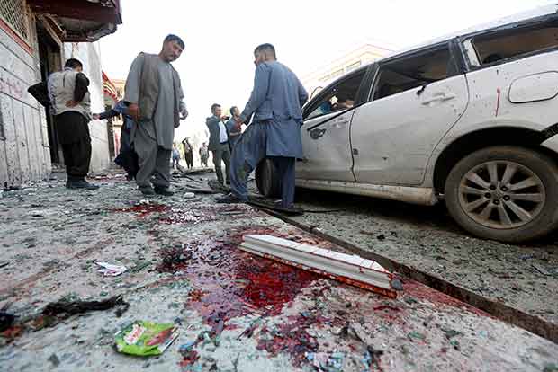 Suicide attack on Kabul voter registration centre kills 48