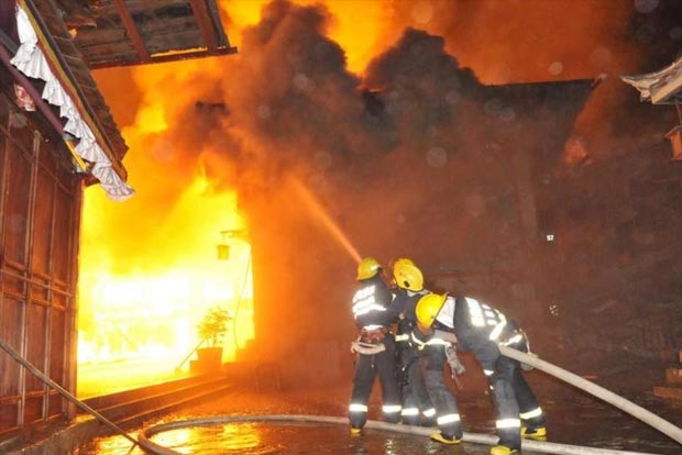 China captures arson suspect in karaoke lounge blaze that killed 18