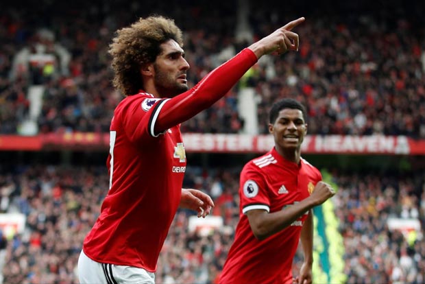Late Fellaini header condemns Wenger to Old Trafford defeat