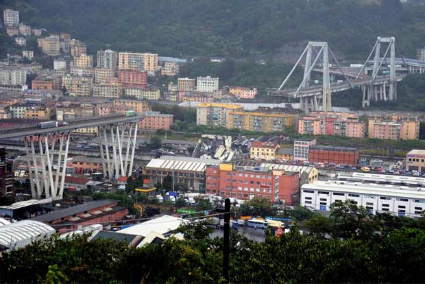 Italy motorway bridge collapses in heavy rains, killing at least 35