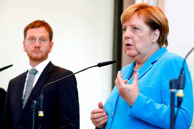 Merkels conservatives under fire over right-wing radicalism in Saxony