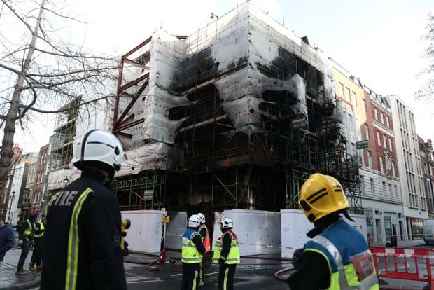 London firefighters tackle blaze at building containing gas cylinders