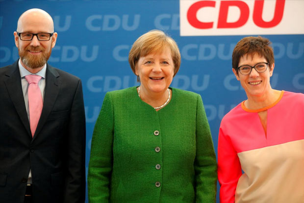 Merkel taps ally for party job, grooming potential successor