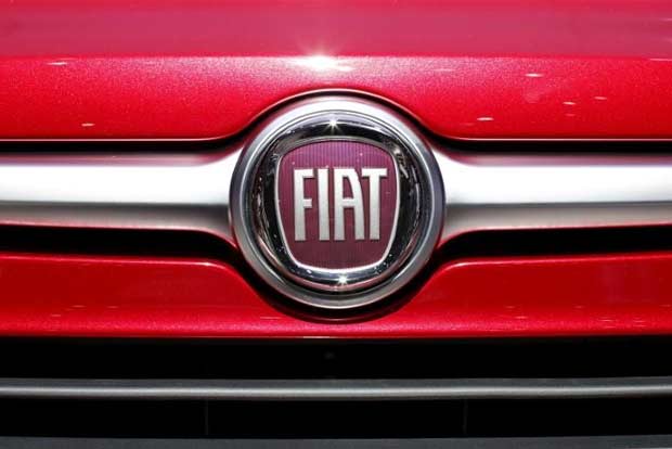 Fiat Chrysler cuts 2018 outlook, shares tumble