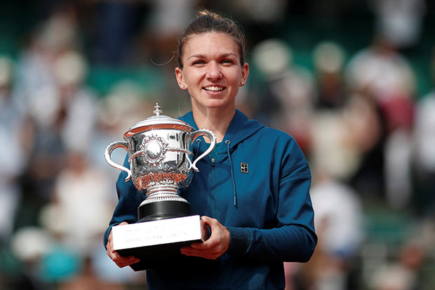 Halep fights back to finally clinch French Open title