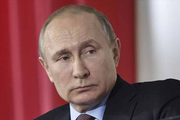 Britain gives Putin until midnight to explain nerve attack on former spy