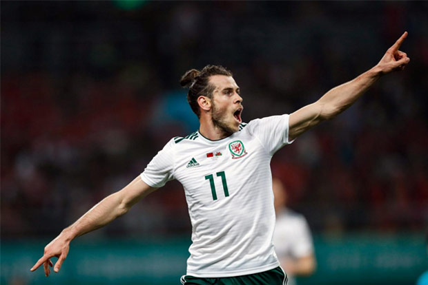 Record-breaking Bale nets hat-trick in Giggs debut as Wales boss
