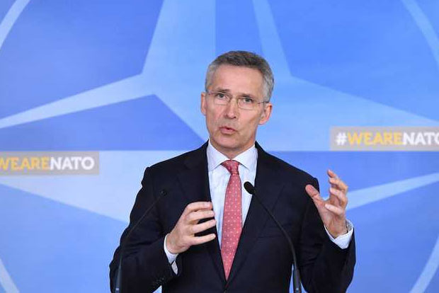 NATO expels seven Russian diplomats, limits size of mission