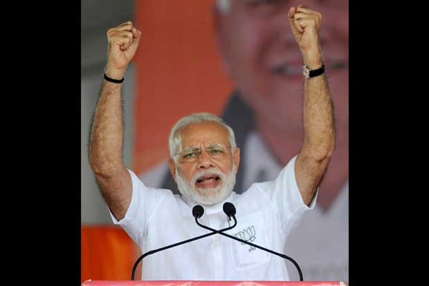 Modi pans Cong for using foul language against Yeddyurappa