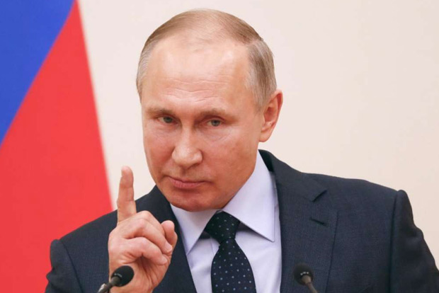 Putin warns against reckless moves after Ukraine declares martial law