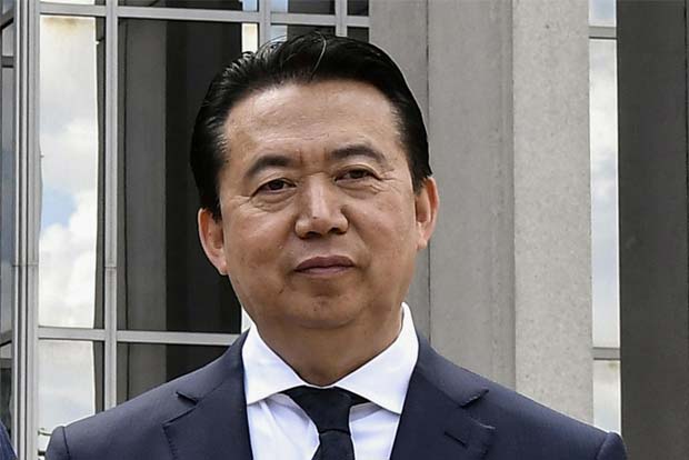 China says Interpol chief under probe for suspected breach of law