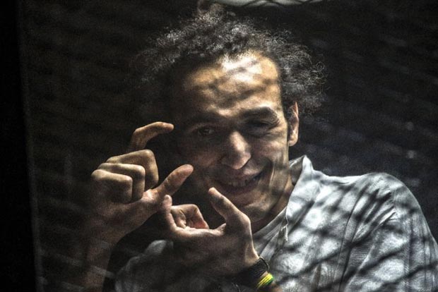 Egypt court hands five-year jail term to prominent photojournalist