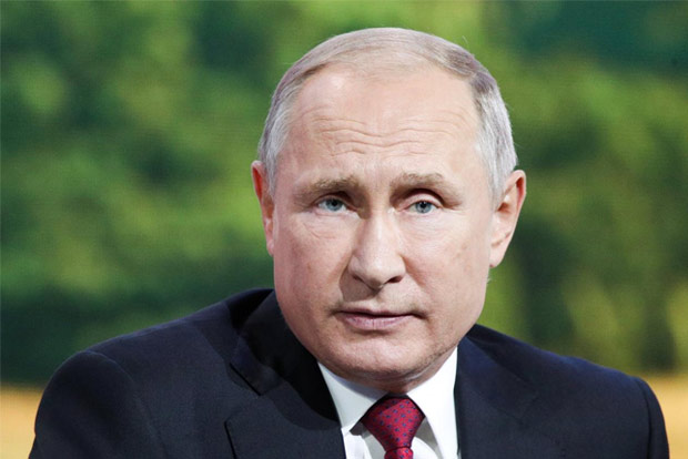 Putin says Russia knows real identity of men accused by UK over poisoning Putin says Russia knows real identity of men accused by UK over poisoning