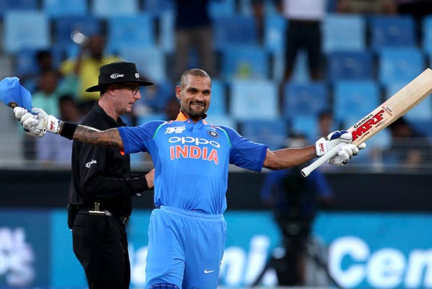 Dhawan scores ton as India manage 285/7 on slow track