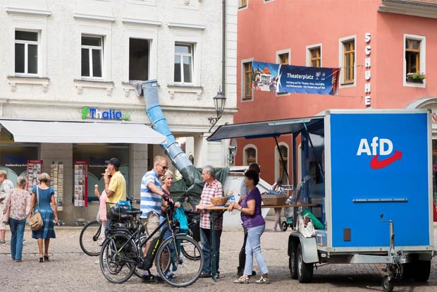Far-right party surge in eastern German regions threatens Merkels coalition