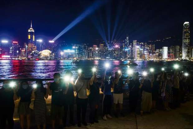 HK protesters form human chain in tribute to Baltic Way