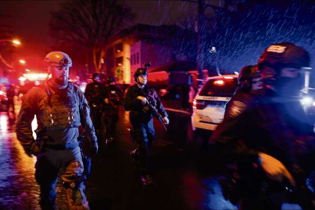 6 killed in New Jersey gunbattle, including police officer