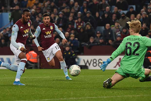 Villa beats Liverpool to reach League Cup semis