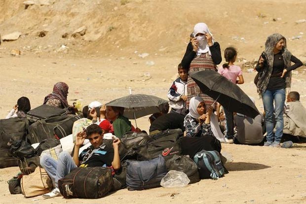 At least 25,000 people fled Syrias Idlib for Turkey over two days: media
