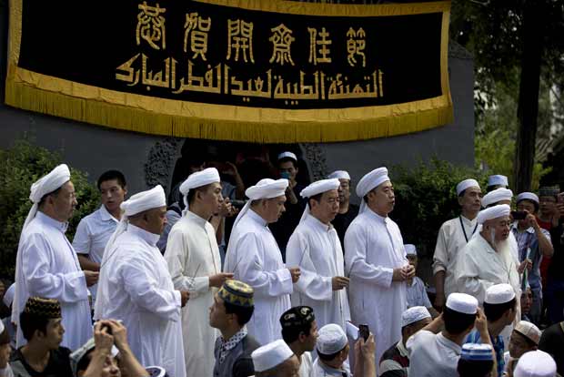 Riot police break up Hong Kong rally for Chinas Uighurs