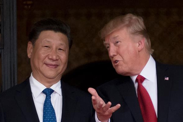 Trump says hell sign first-step China trade deal on Jan 15