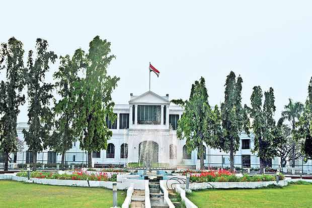 SP legislators sit on dharna outside Raj Bhawan