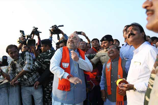 Shah, Rupani celebrate Uttarayan by flying kites