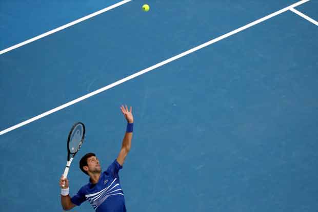 Djokovic clobbers qualifier Krueger to reach second round