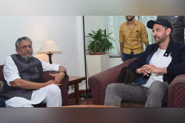 Sushil Modi draws flak for watching movie amid floods in Bihar