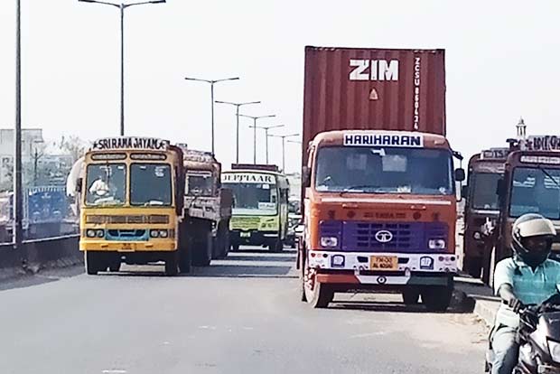 Citizen Connect: Container trucks eat up space, affect traffic flow on Ponneri High Road Citizen Connect: Container trucks eat up space, affect traffic flow on Ponneri High Road