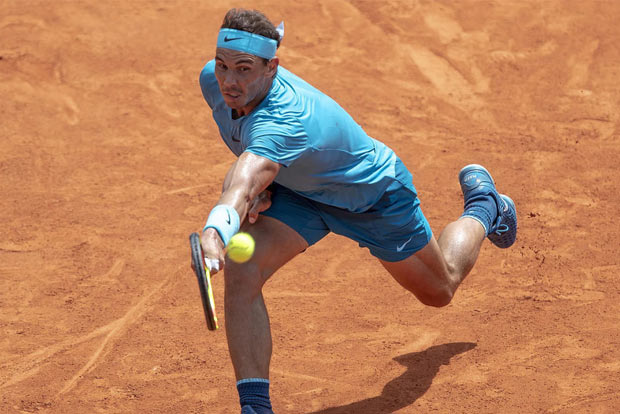 History man Nadal sweeps to 12th French Open and 18th Grand Slam title