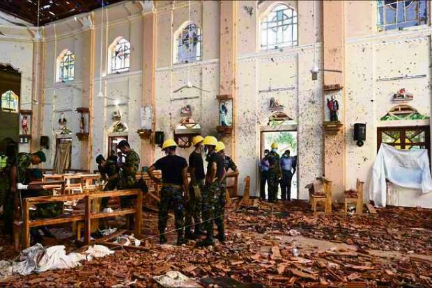 Lankas sacked top defence official faces charges for criminal negligence over Easter bombings