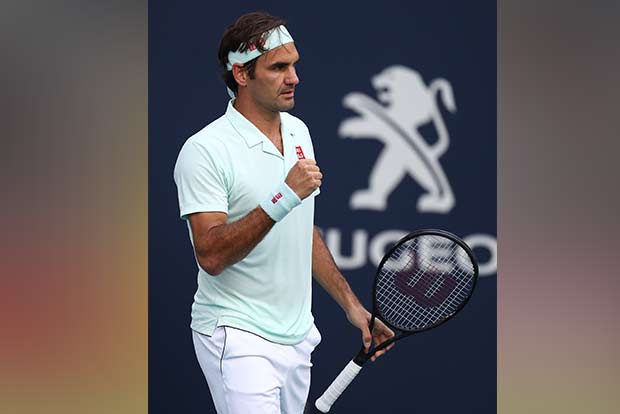 Federer in last eight, Isner enters semis