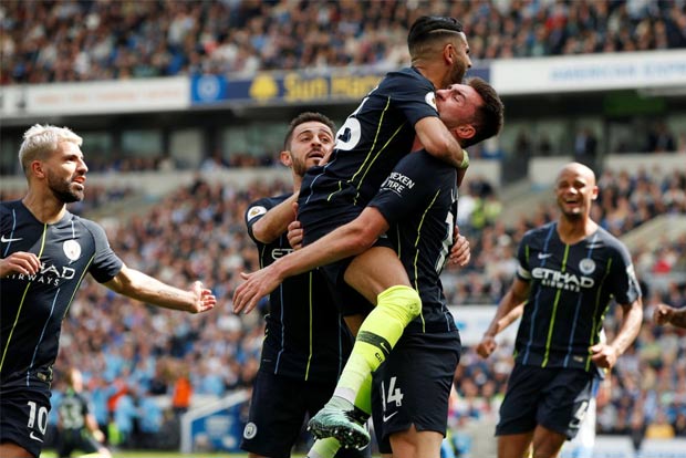 Man City batter Brighton to retain Premier League title