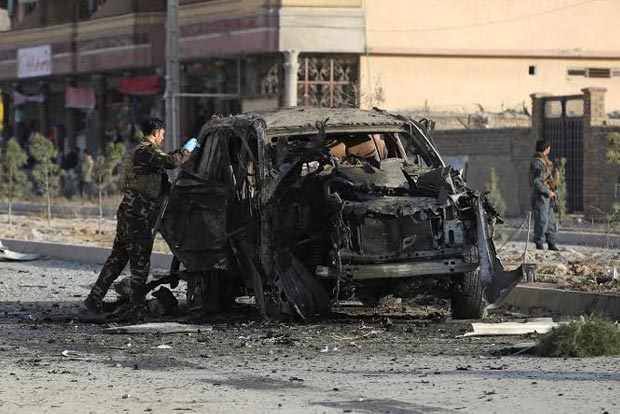 Afghan officials: Kabul car bomb killed 12, including children