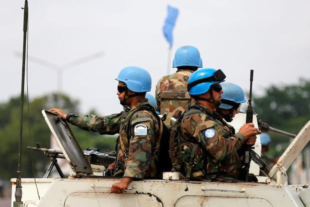 Thirteen killed by suspected militia in troubled east DR Congo