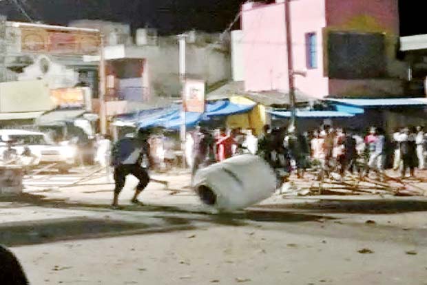 Vijay fans resort to vandalism over delay in movie screening, held Vijay fans resort to vandalism over delay in movie screening, held