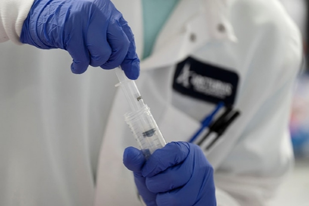 Experts warn of risks as pharmas race to develop vaccine